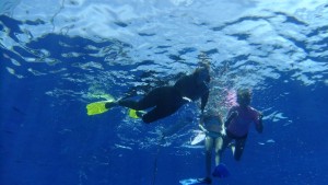 This is a picture with myself, Karin and Sophia, taken as seen from  the divers below us. They dived to about  17m. Here they were coming up