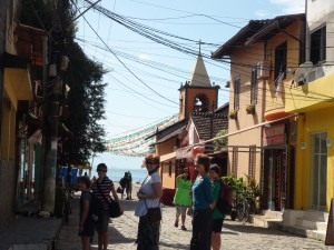 Walking through Abraõ. The town is getting ready for a religious festival on the morrow.