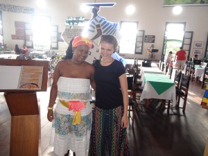 One of the waitresses in traditional costume standing here with Marike.